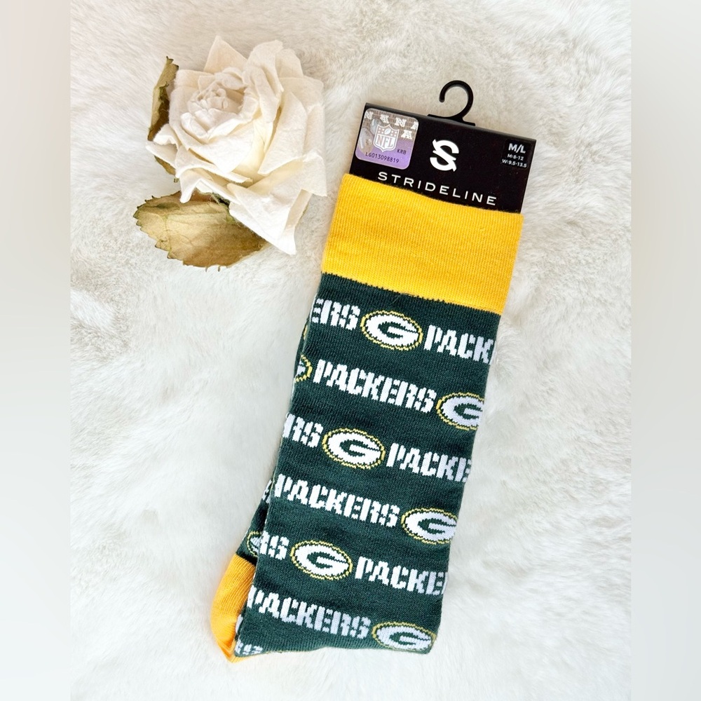 New with tags GREEN-BAY PACKERS Official NFL SOCKS. Green,Yellow with white